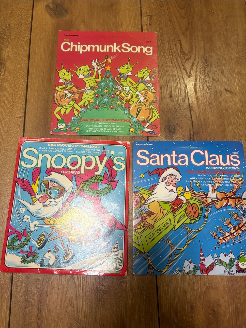 Peanuts Vinyl Holiday Trio - Red, Blue & Yellow Covers